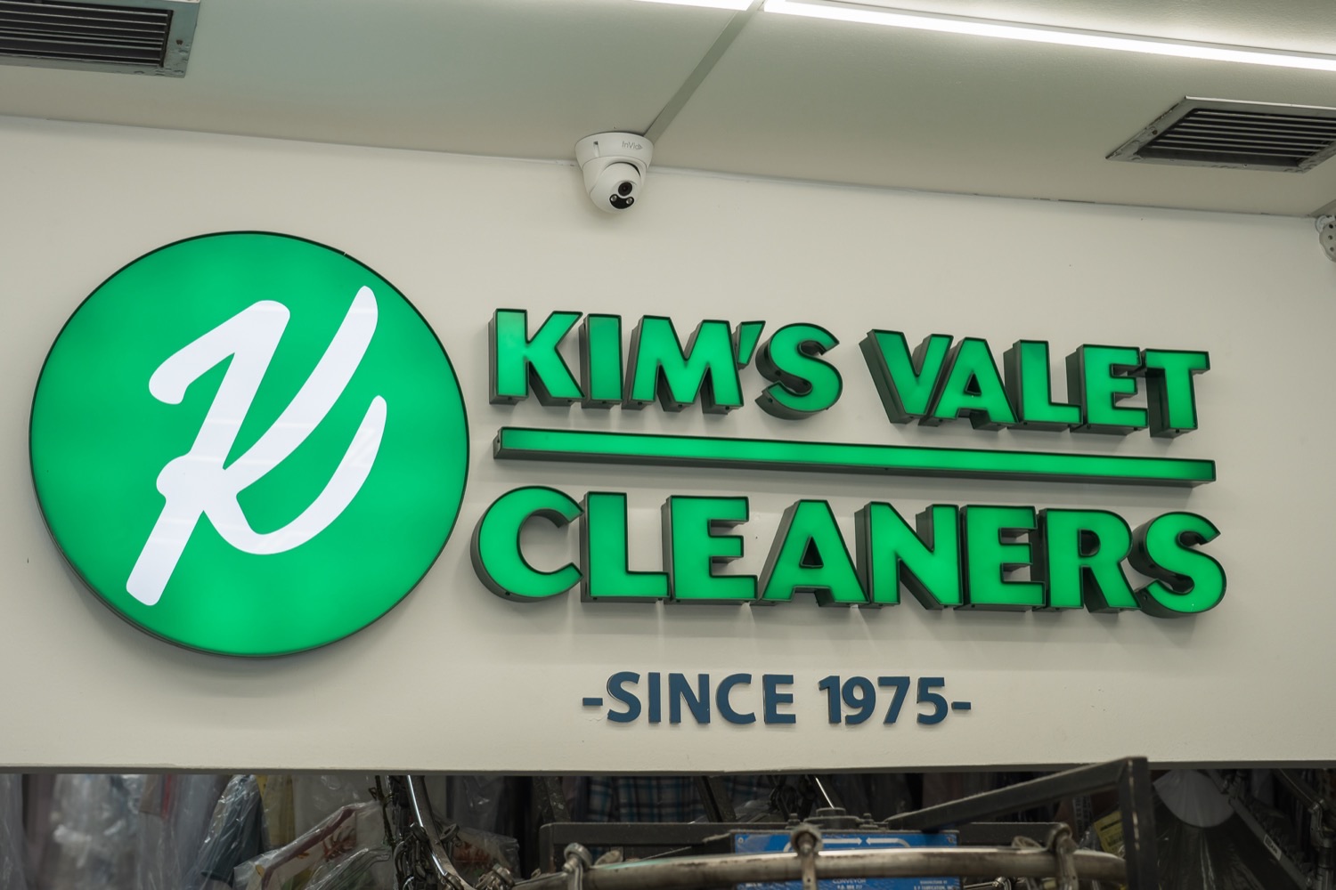 The Kim's Valet Cleaners neon sign, serving Miami since 1975