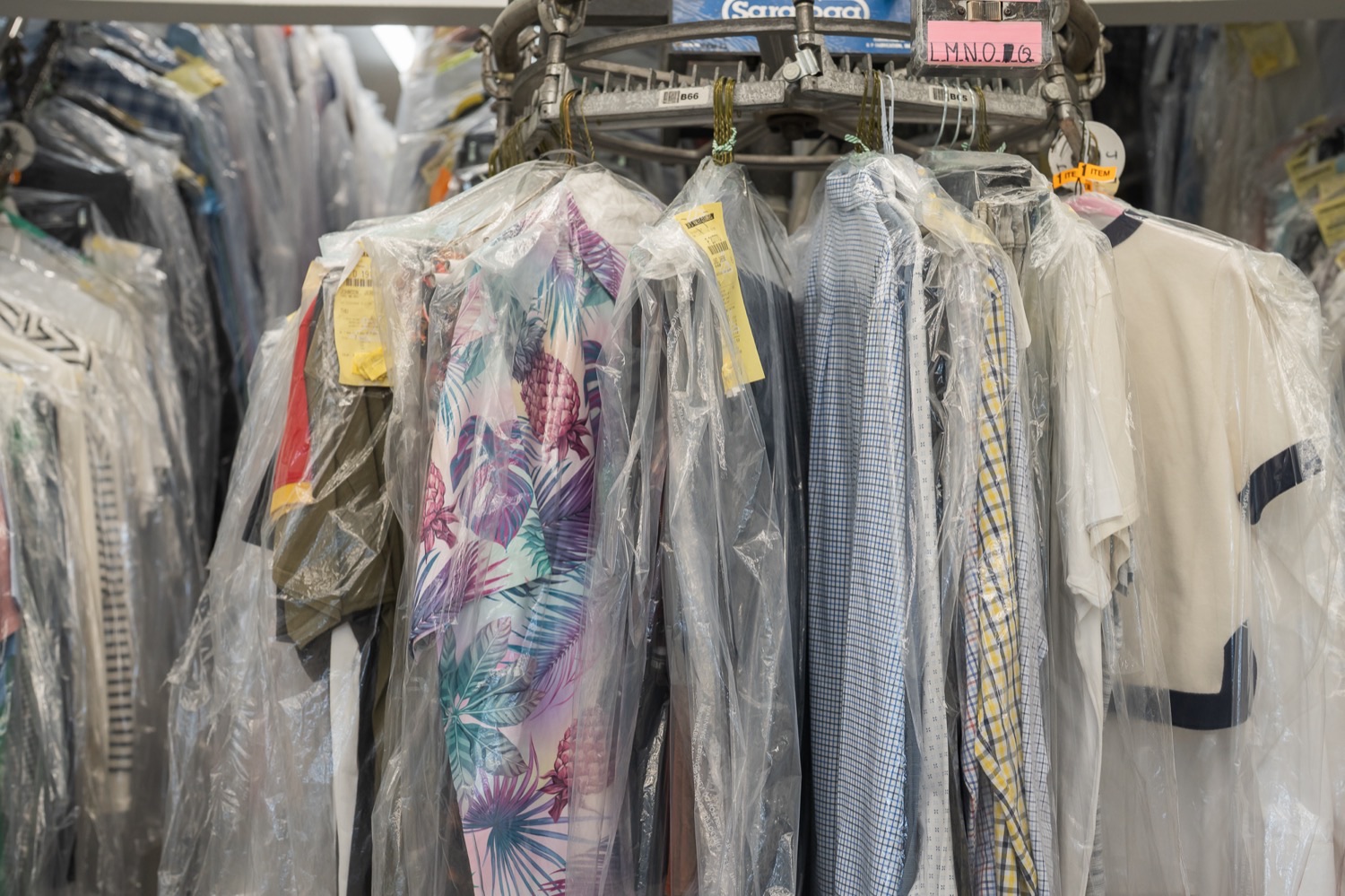 Freshly laundered and pressed shirts on the rail, wrapped and ready