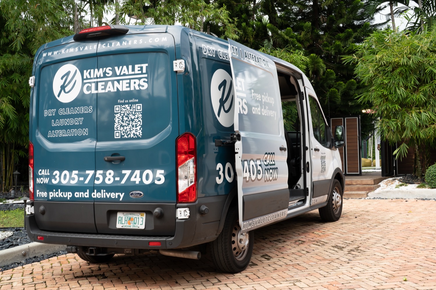 The Kim's Valet Cleaners van dropping off a fresh order at a Miami home